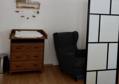 Changing table and breastfeeding corner